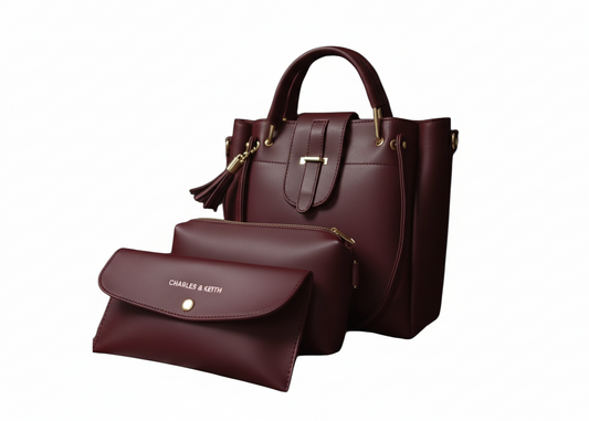 Brown handbag with matching pouch on a white background