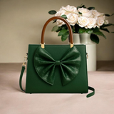 SIGNATURE BOW BAG | skin